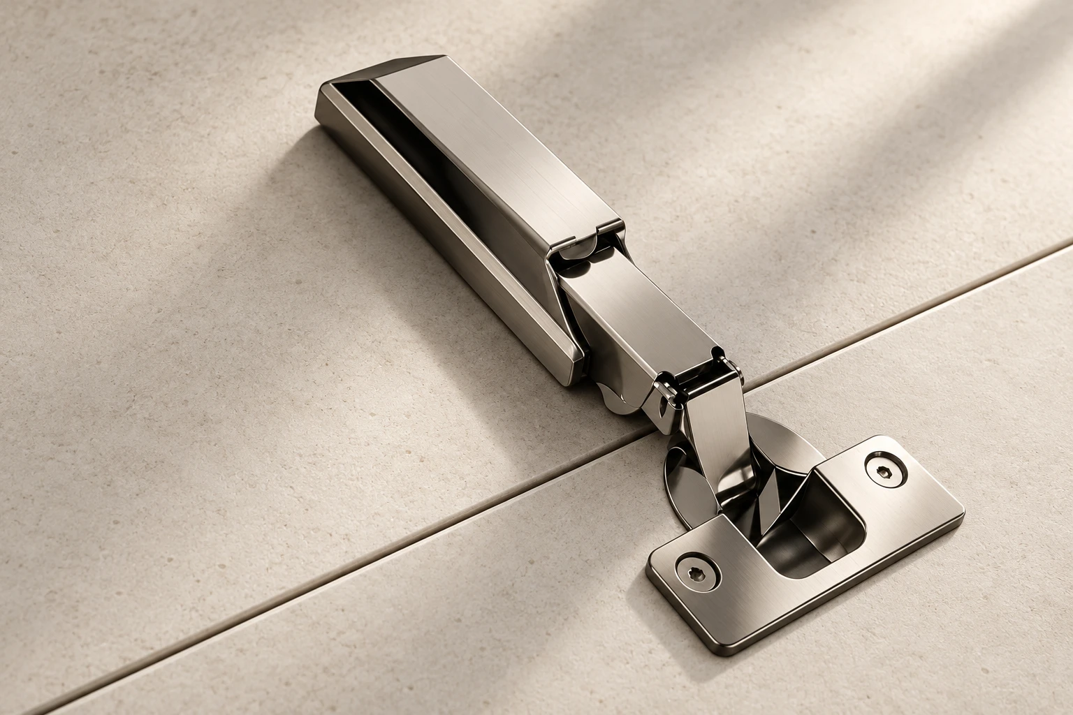 Brushed metal concealed soft-close hinge for kitchen cabinetry